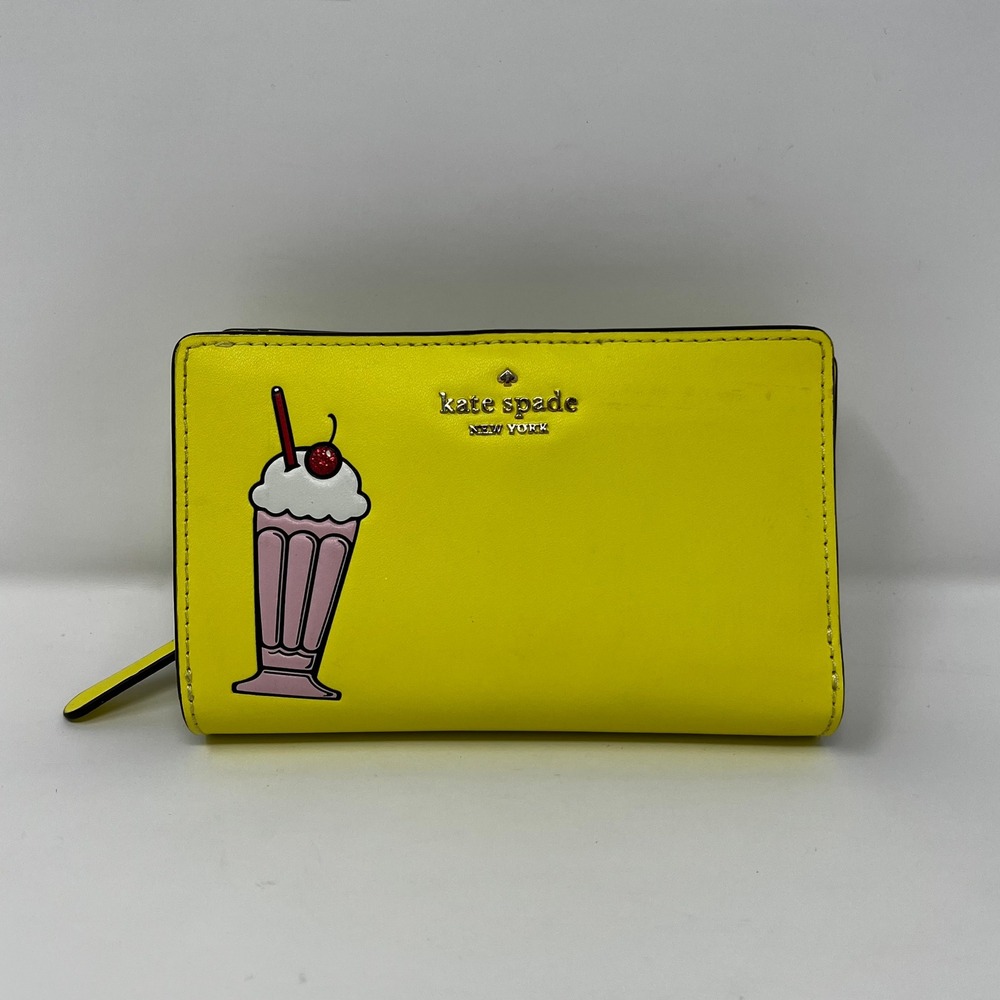 Kate Spade Archie Comics New York Yellow Milkshake Bifold Wallet Zip Around
